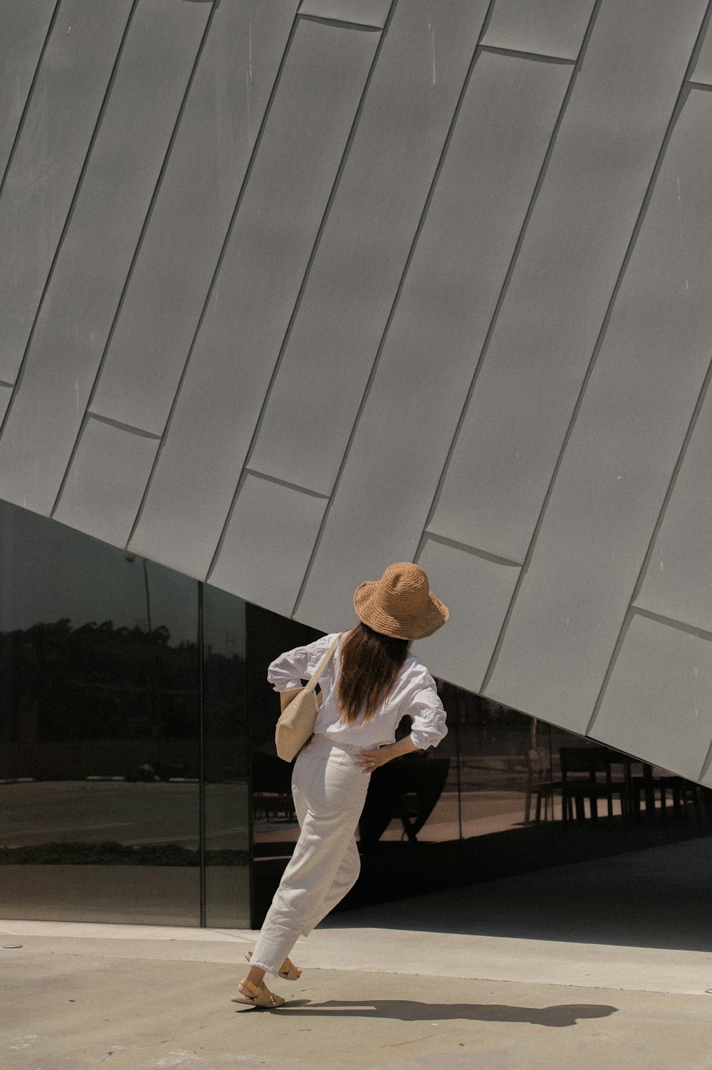 woman standing outside building