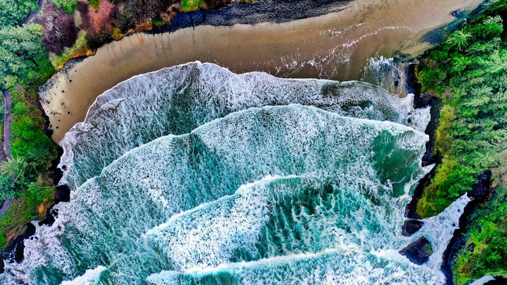 an aerial view of a beach and a body of water