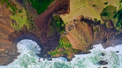 aerial view of cliff and sea