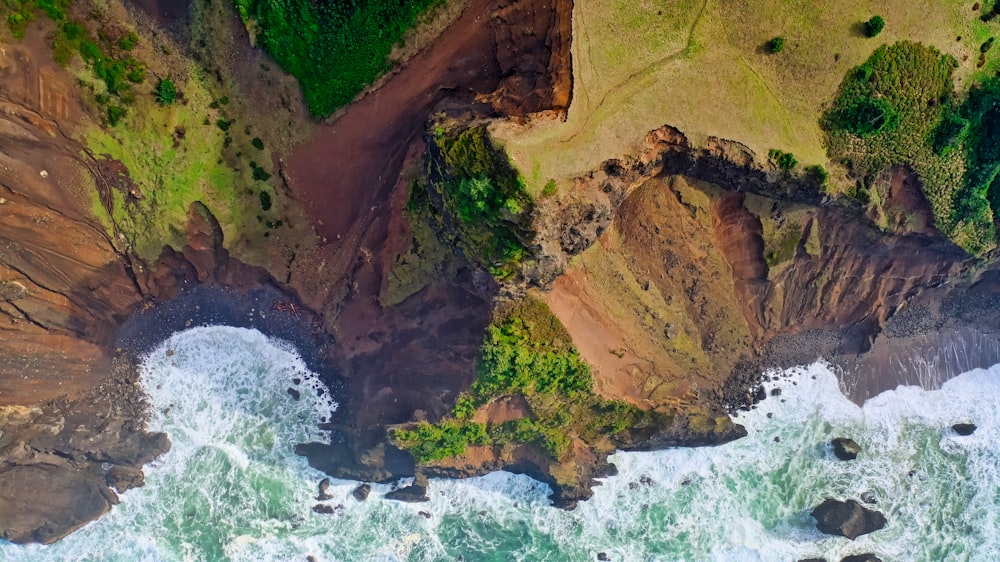 aerial view of cliff and sea
