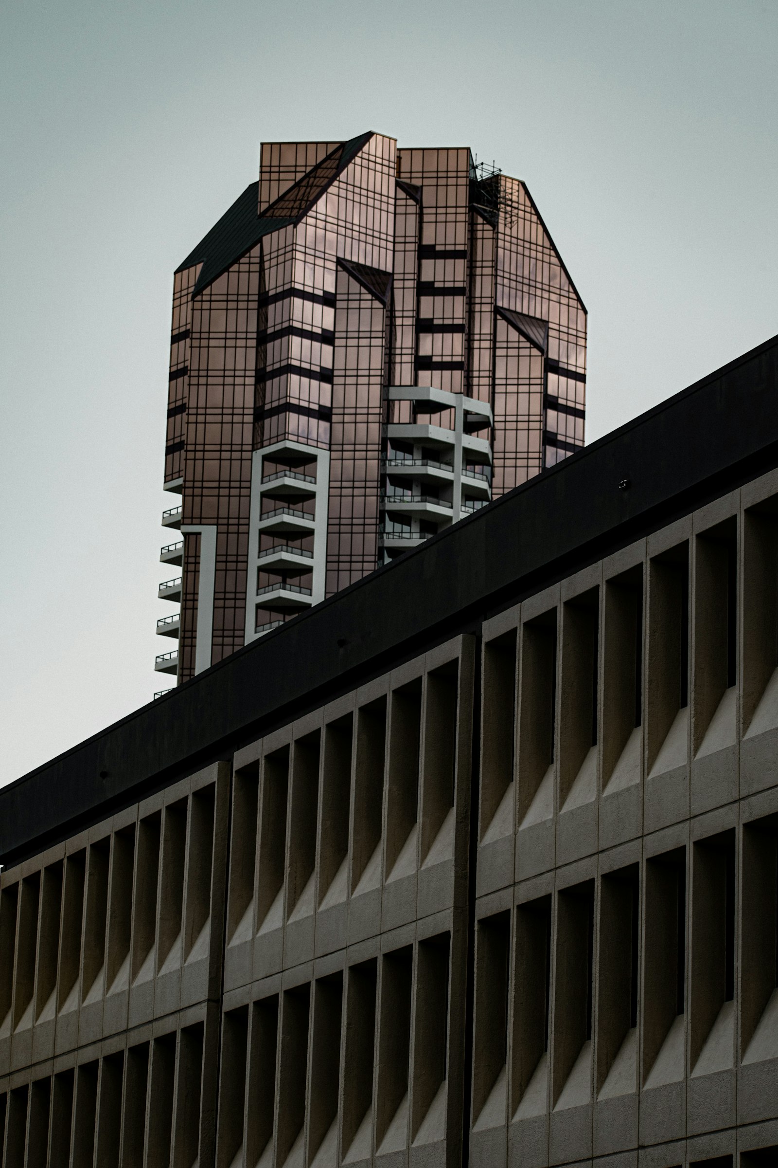 Nikon AF-P DX Nikkor 70-300mm F4.5-6.3G sample photo. Brown high rise building photography