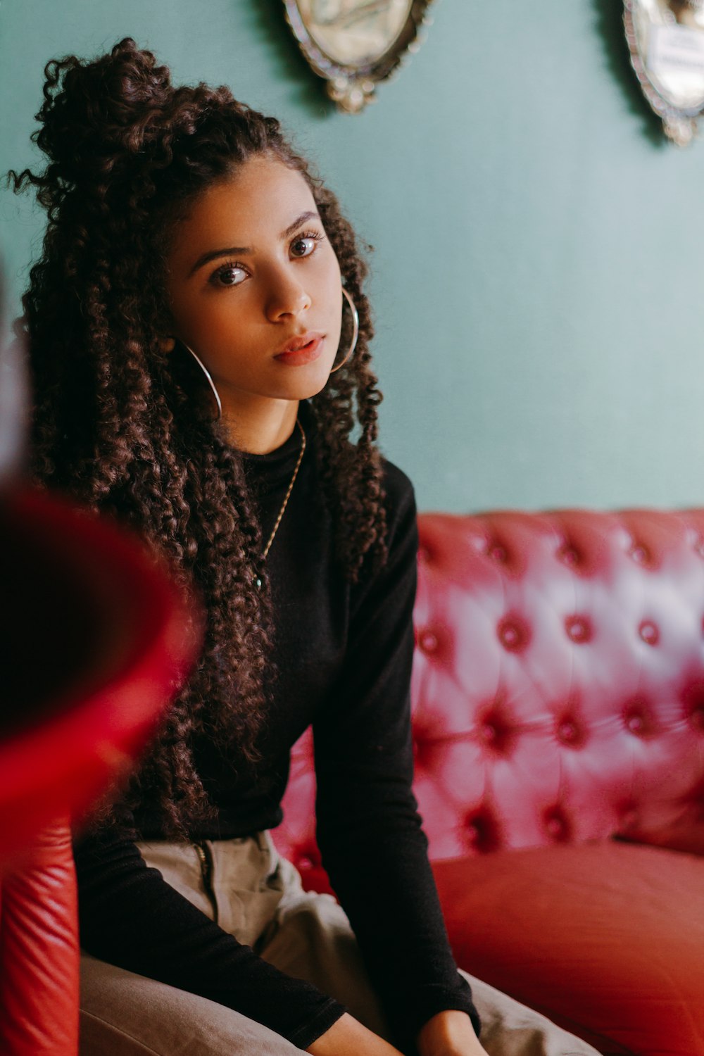 shallow focus photo of woman in black long-sleeved shirt