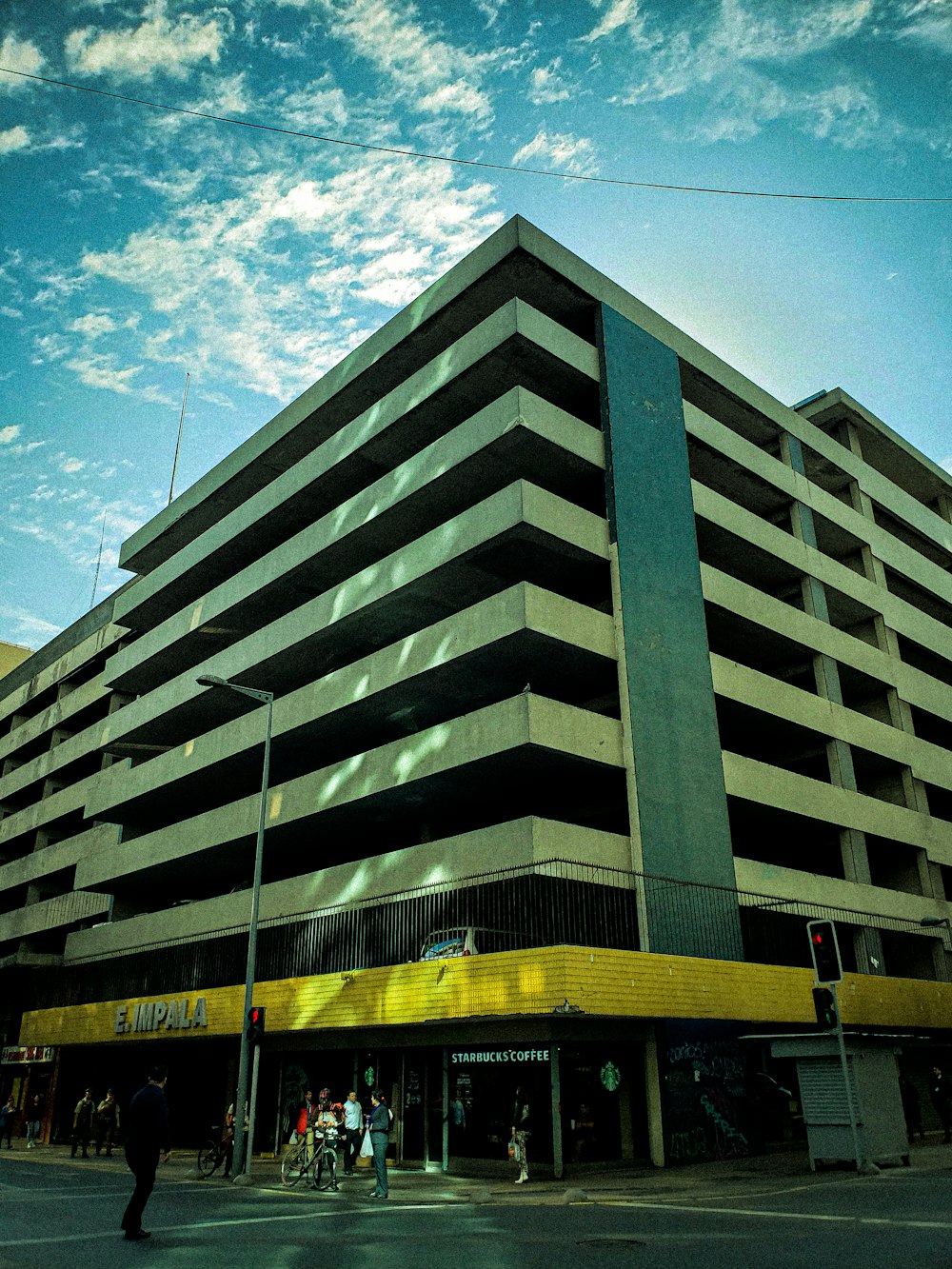 concrete building under cloudy sky