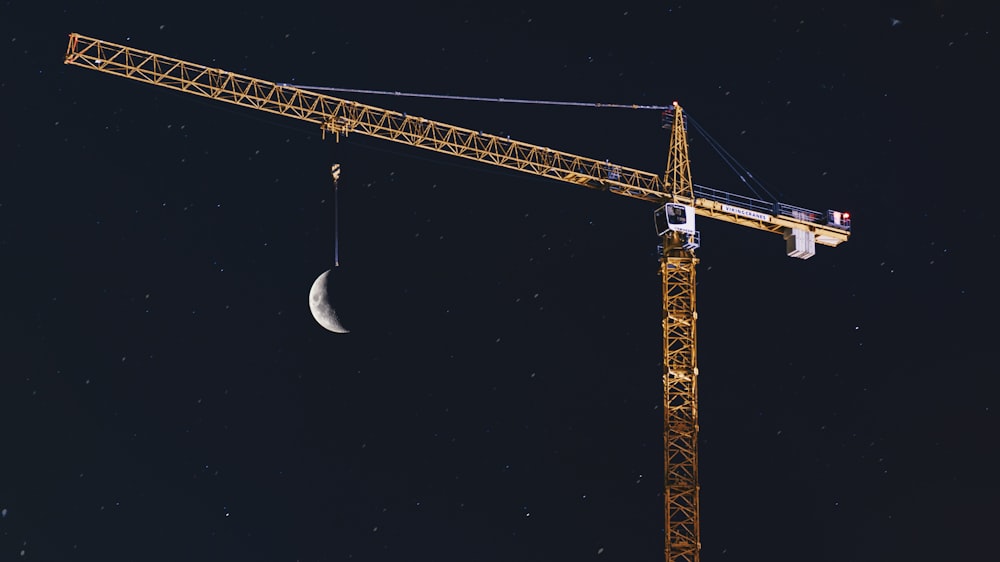 yellow crane during nighttime