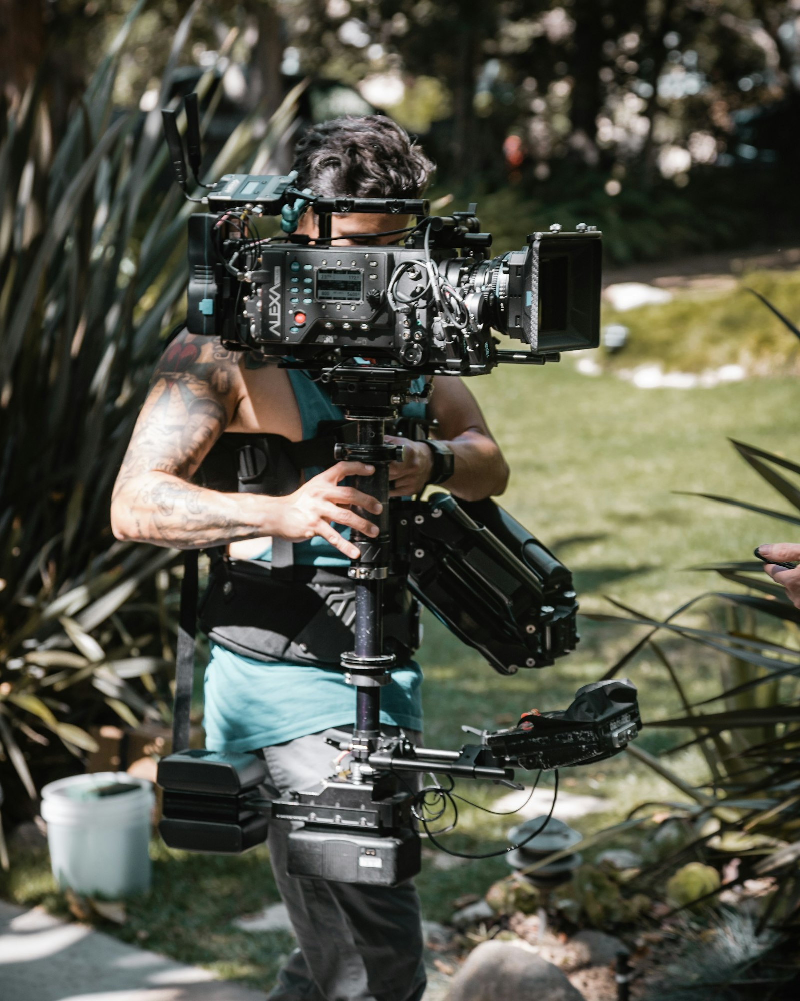 Sony a7S II + Canon EF 24-105mm F4L IS USM sample photo. Man wearing green tank photography