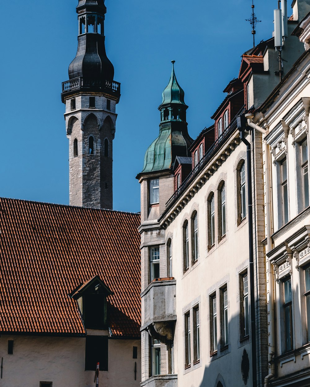 white and brown concrete buildings under clear sky