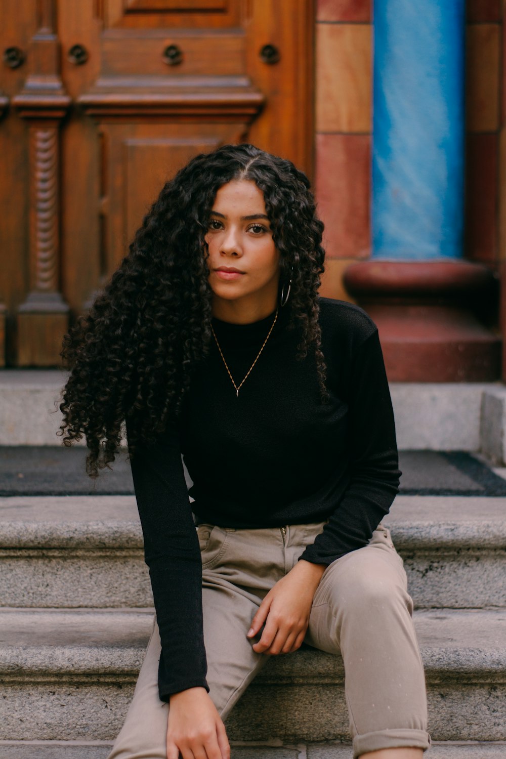 shallow focus photo of woman in black long-sleeved shirt