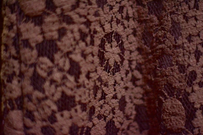A close-up of delicate fabric textures showcasing elegant patterns.