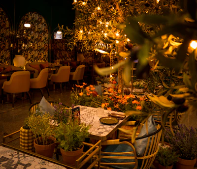 A small, simply furnished restaurant interior with tables set, evoking a traditional neighbourhood tasca