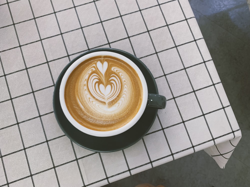latte in white ceramic mug
