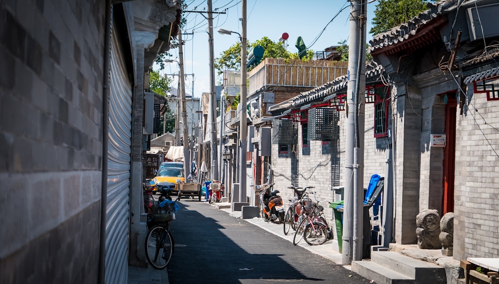 parked bicycle lot beside houses