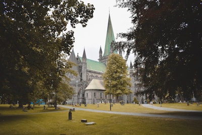 Peaceful garden area beside the cathedral with benches and greenery