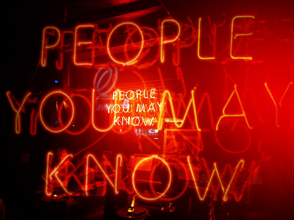 orange People You May Know neon signage