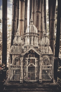 A beautifully designed bird cage showcasing intricate details.