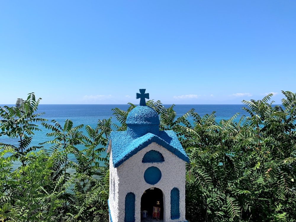 white and blue dome church