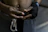 A focused martial artist wrapping hands before boxing training