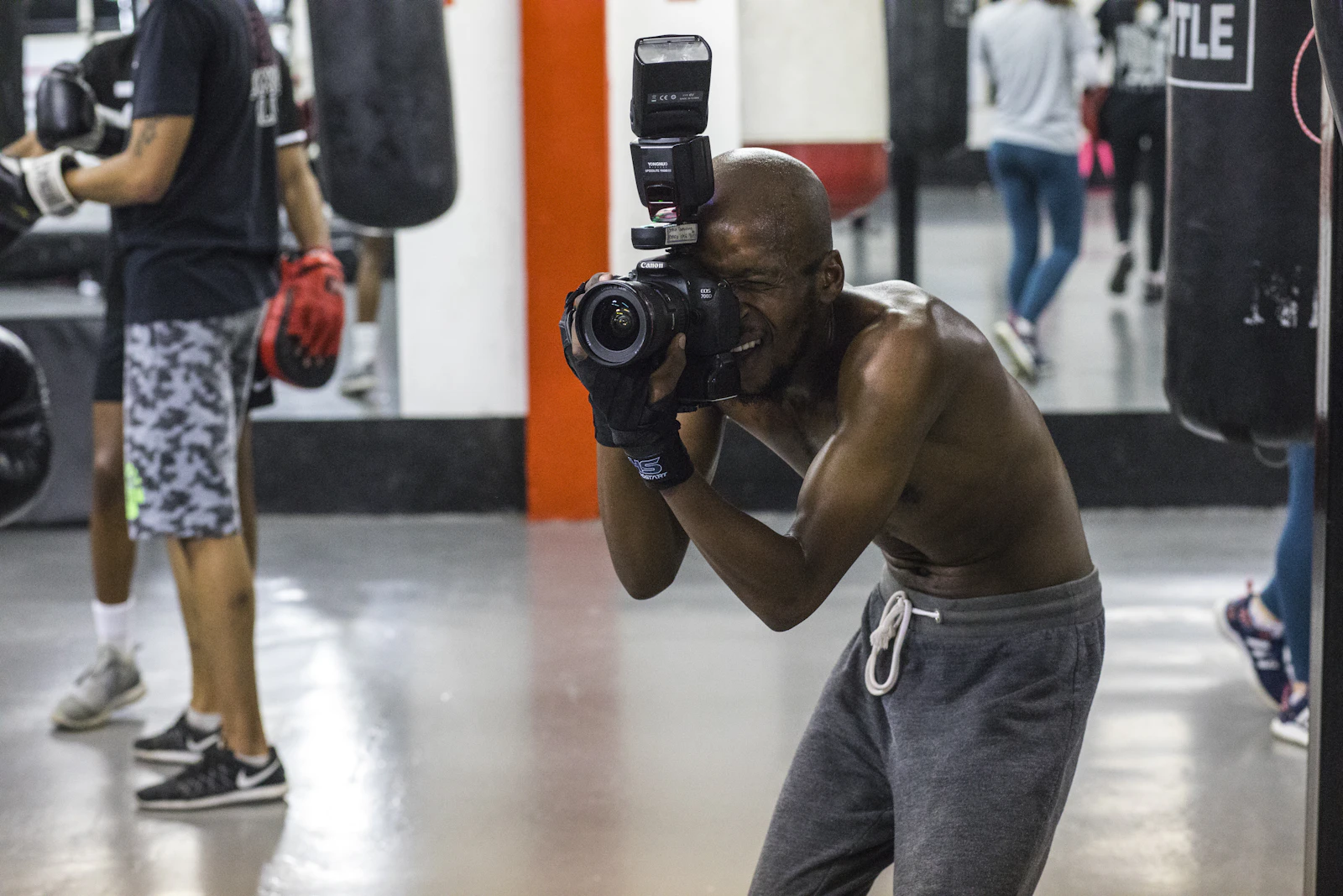Photographer taking a picture with a DSLR camera