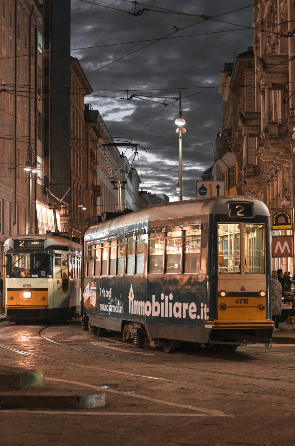 white and black double decker bus near buildings