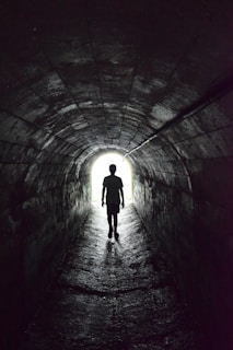 silhouette of person walking on focus photography