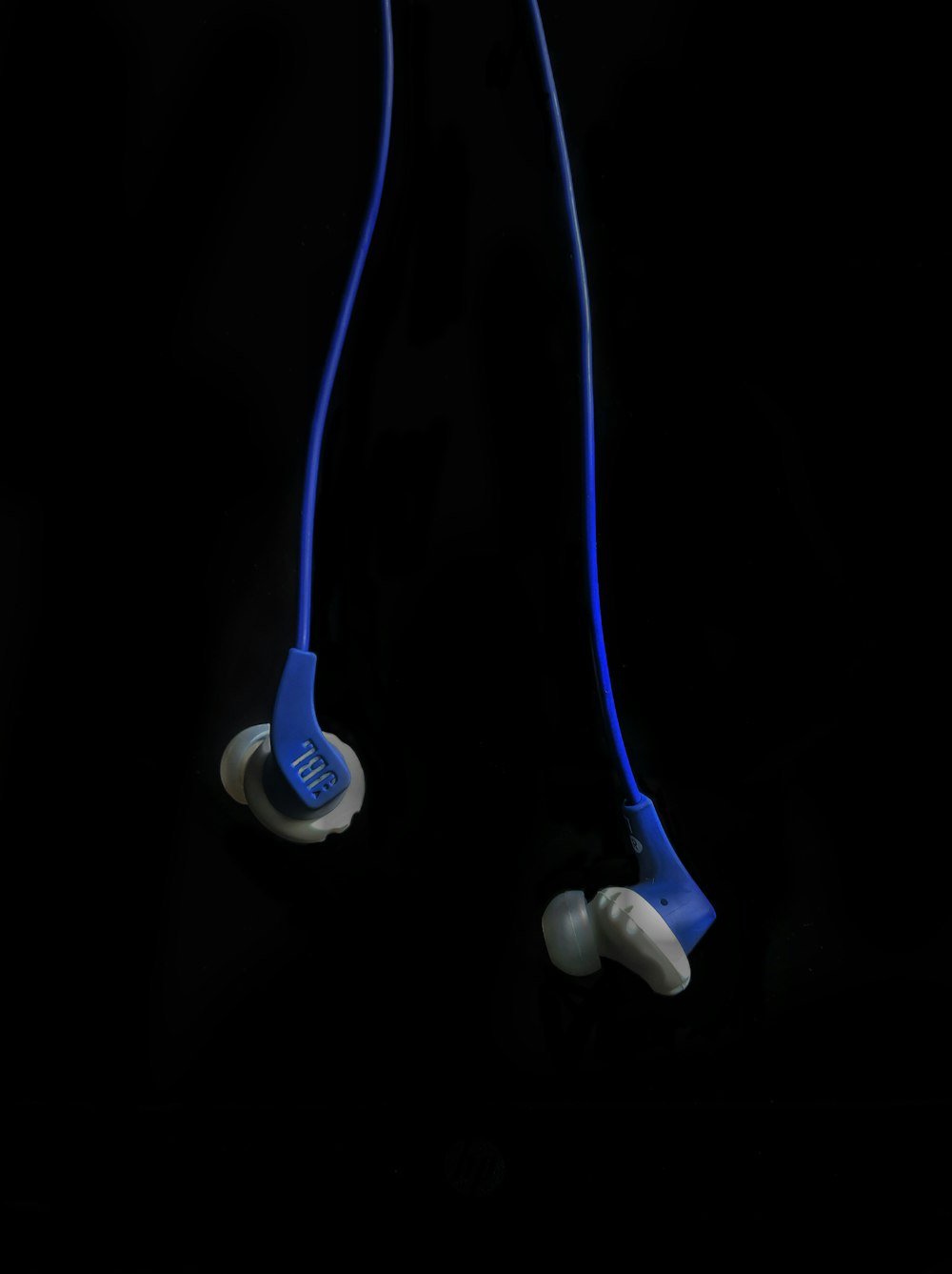 blue JBL earbuds