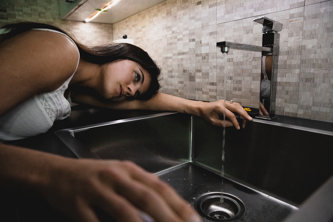 woman near sink