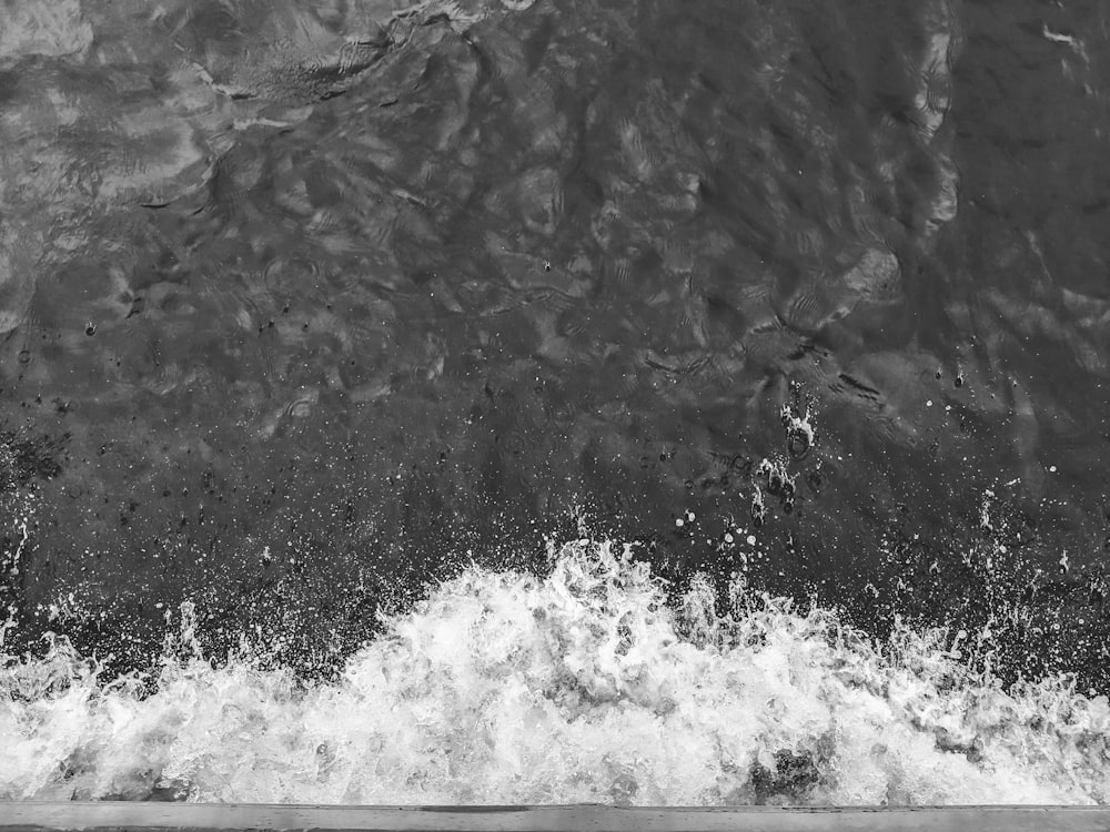 grayscale time-lapse photography of splashing water