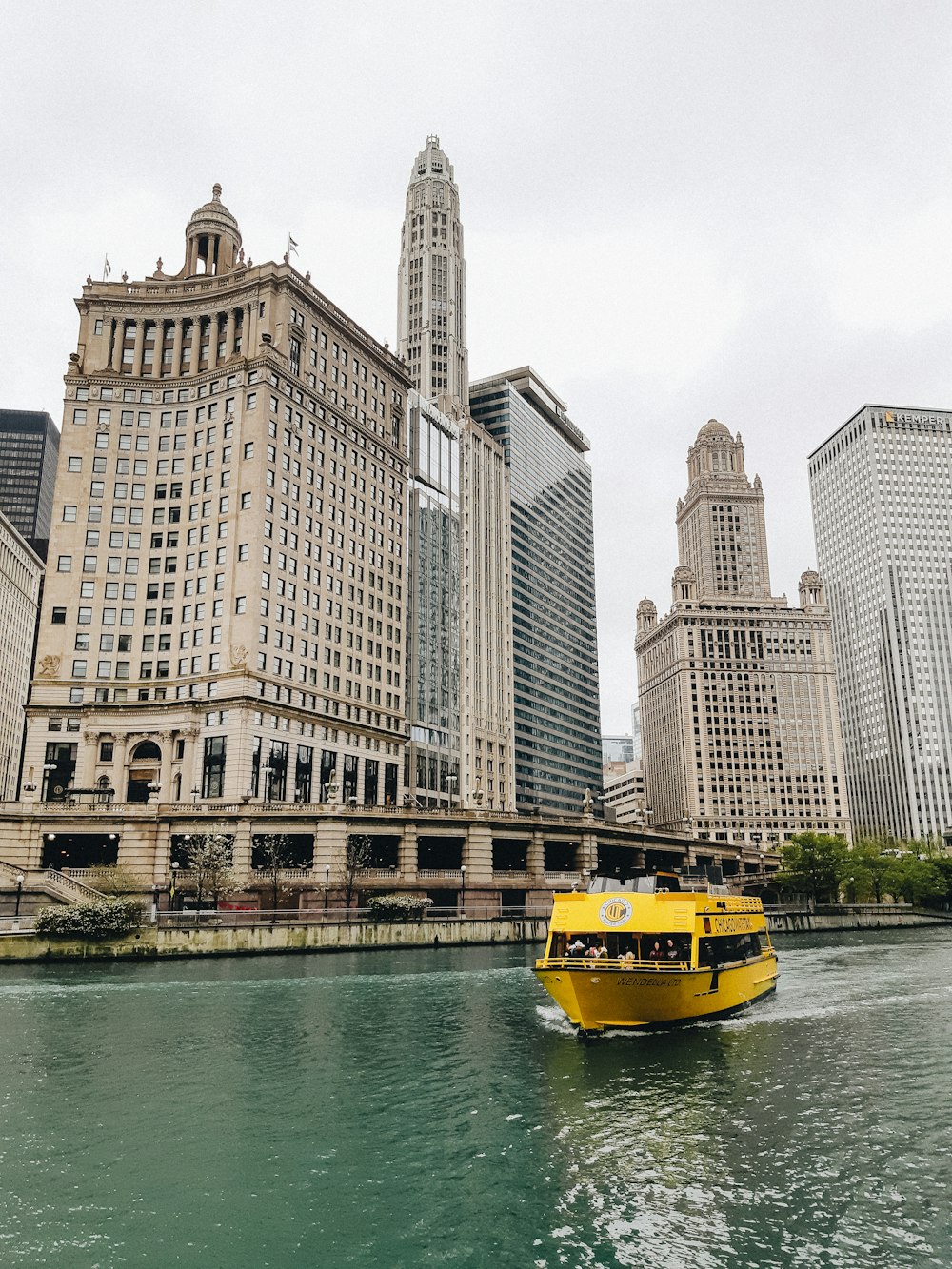 yellow ship near buildings