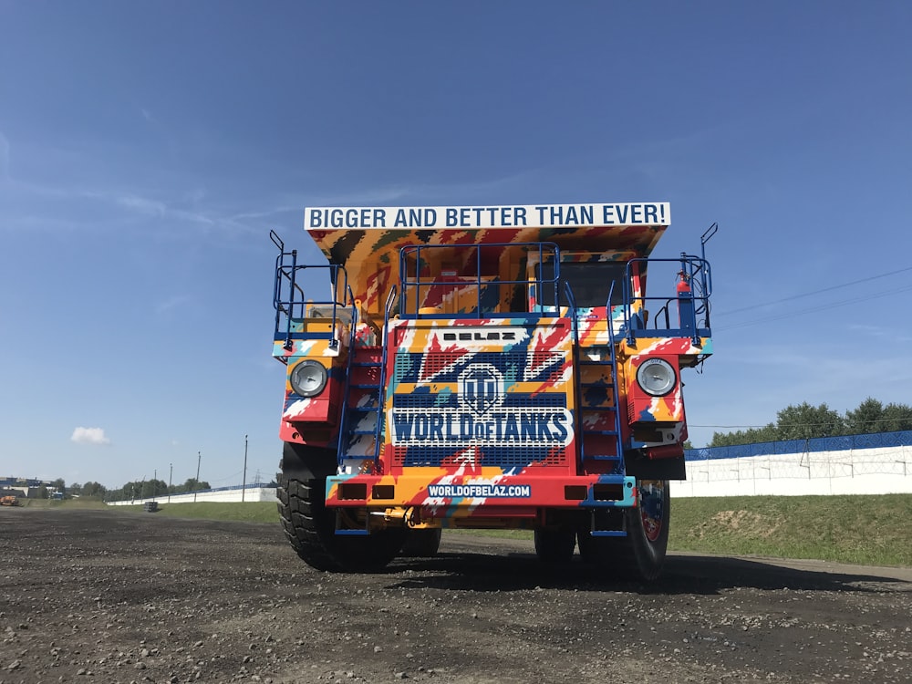 blue and multicolored vehicle under blue sky