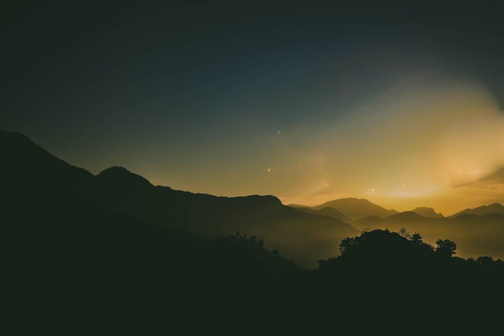 silhouette photography of mountains