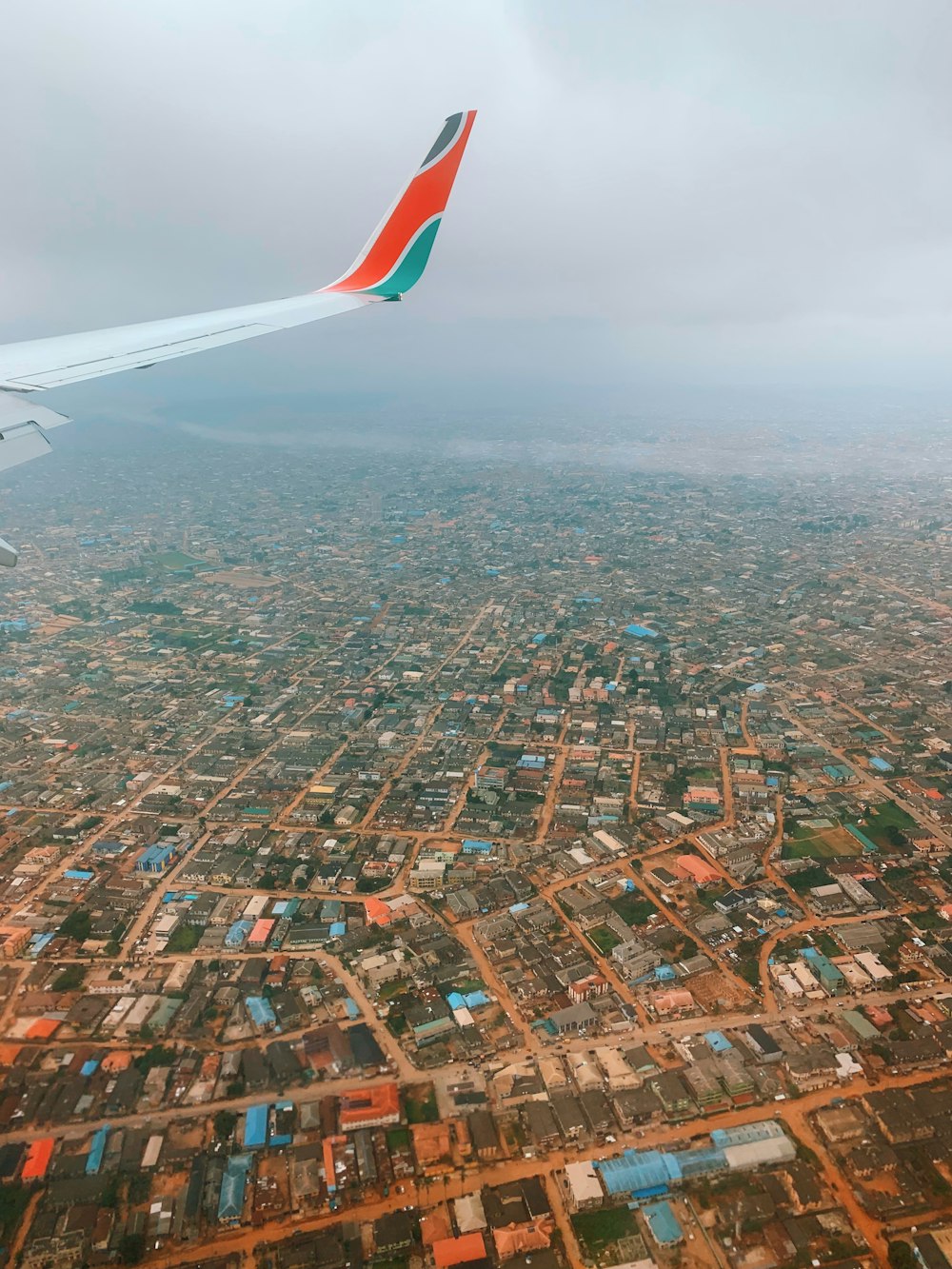 white and orange airplane wing