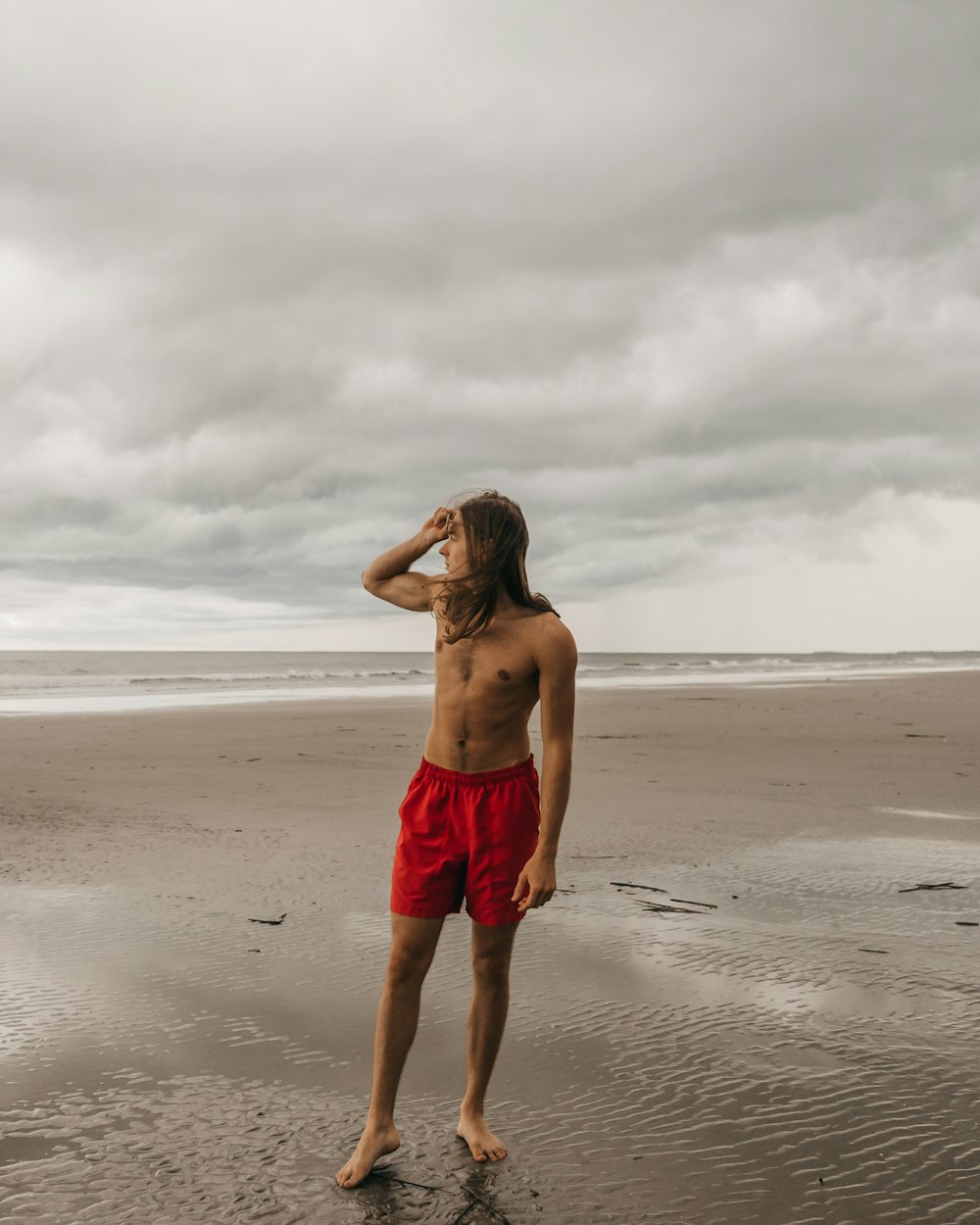 man in red shorts