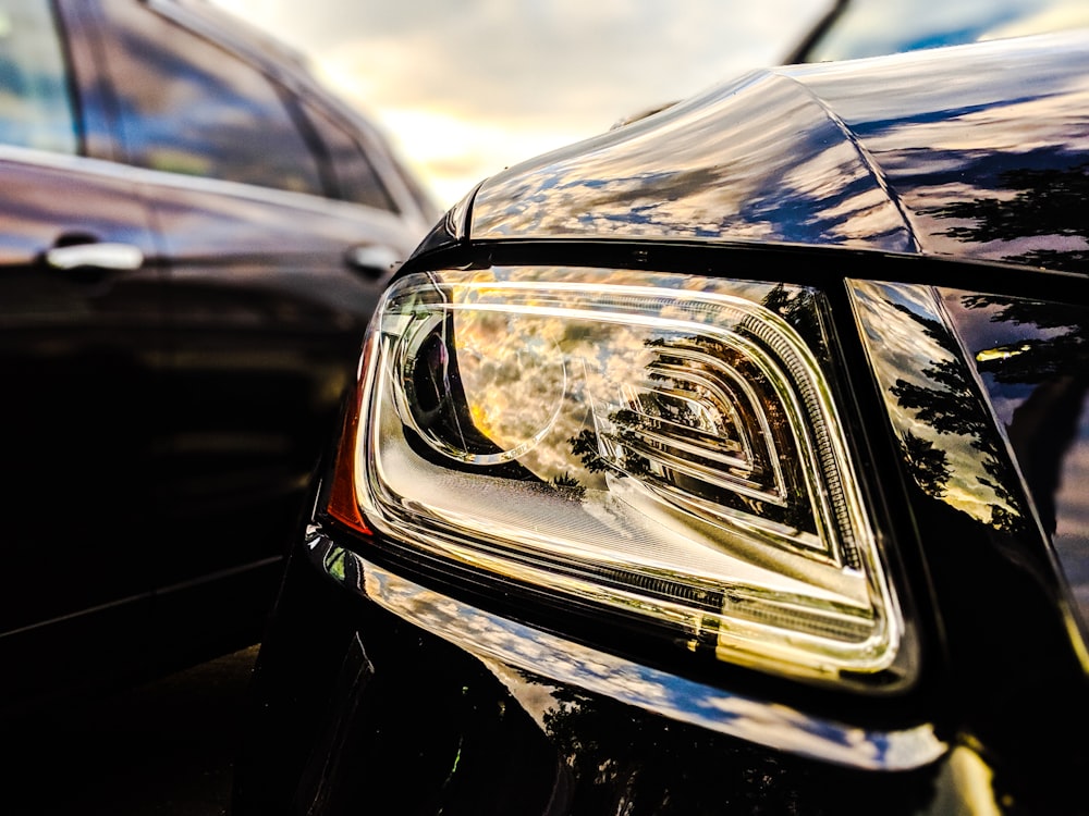 selective focus photo of vehicle headlight