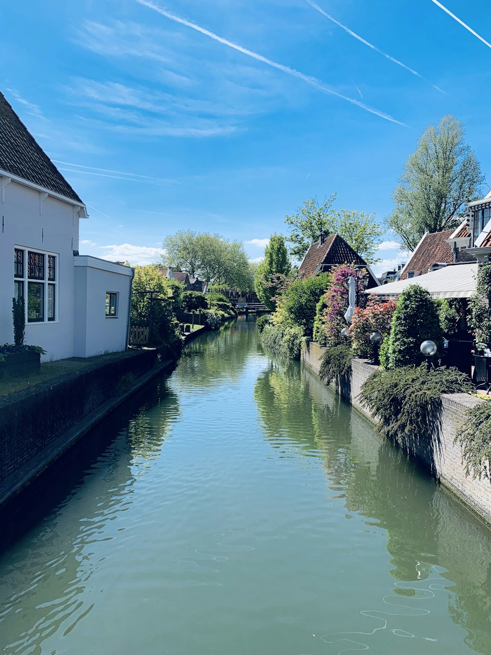 photography of buildings and river during daytime