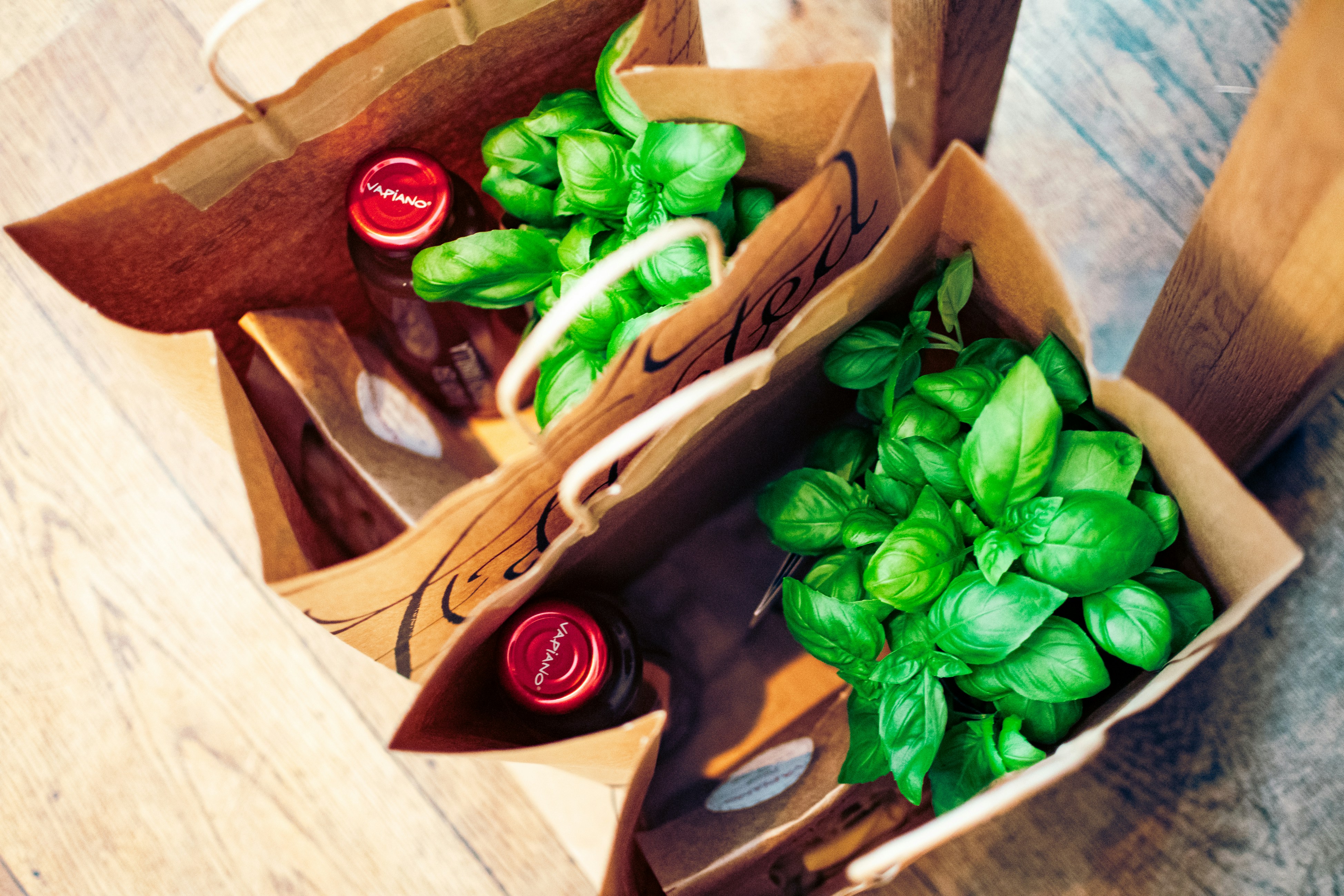 Paper boxes of fresh basil