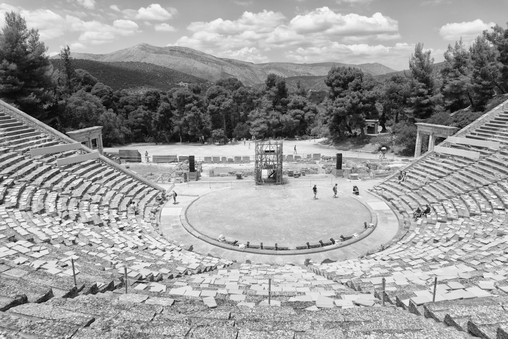 grayscale photo of round stadium