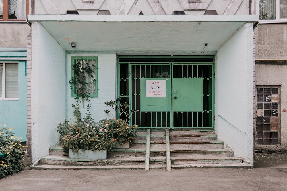 building with closed French gates