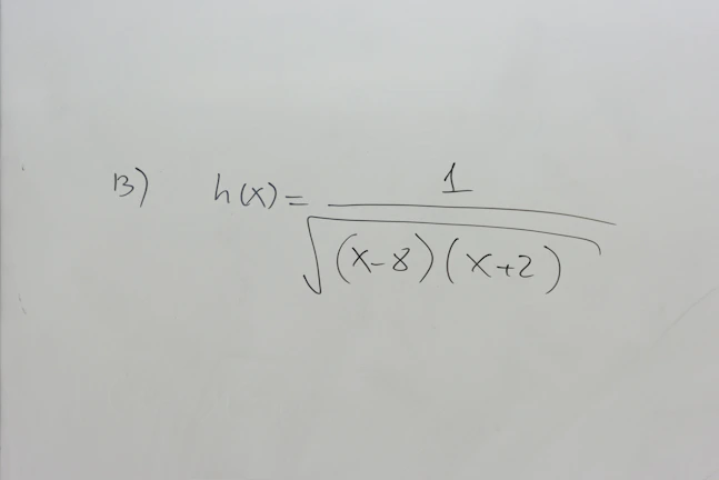 Screenshot of a video explaining quadratic functions with annotated graphs.