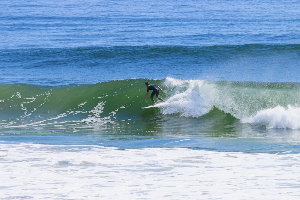 person surfing during daytime