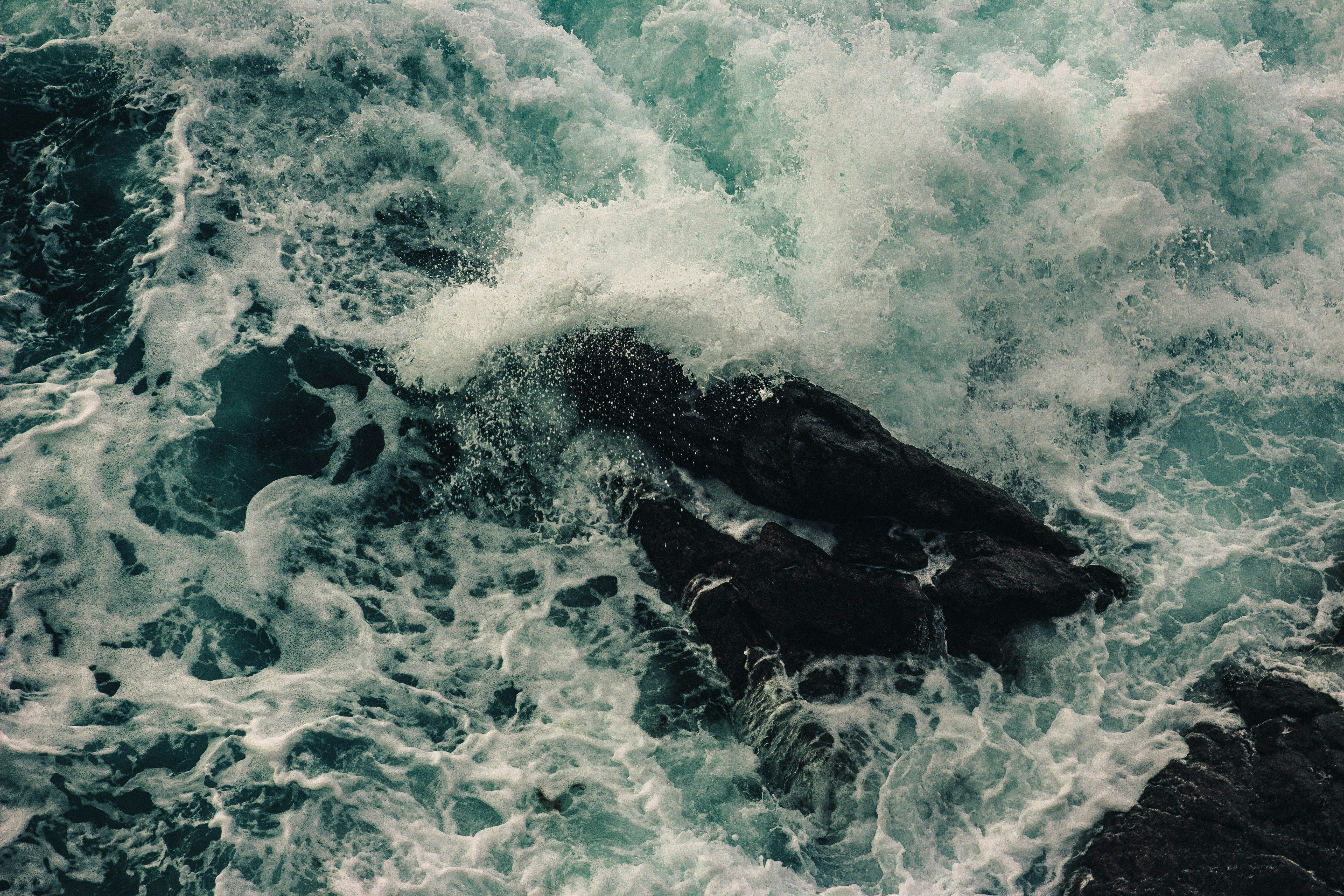 a large body of water surrounded by rocks