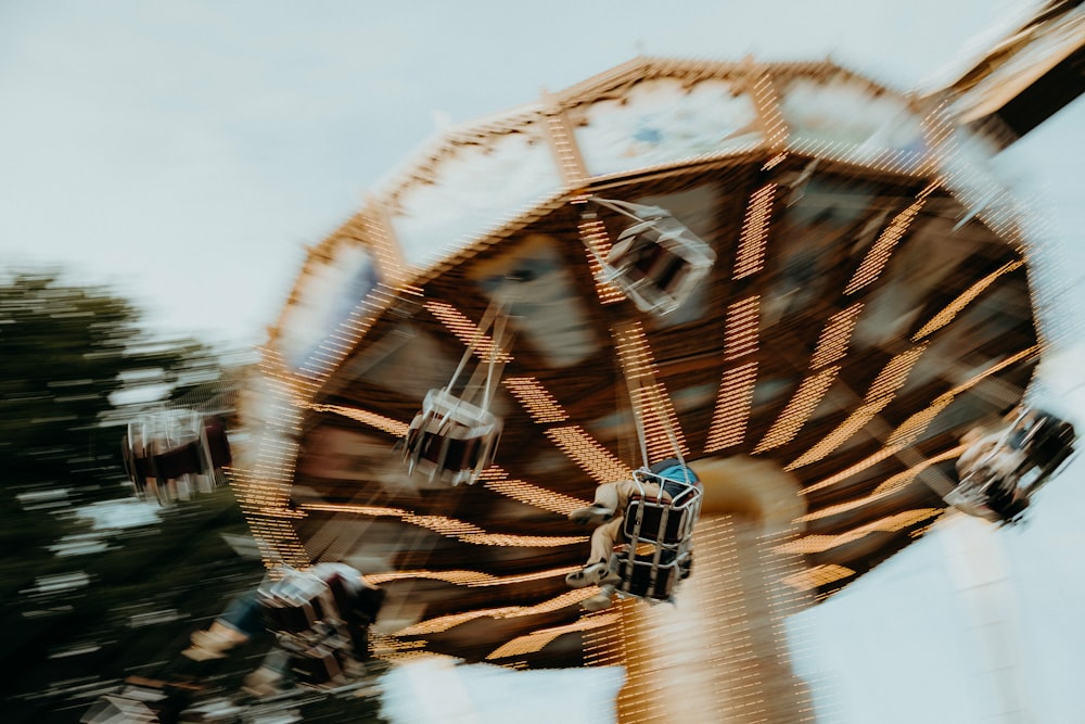low angel photo of spinning ride