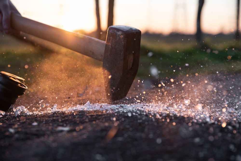 brown hammer on focus photography