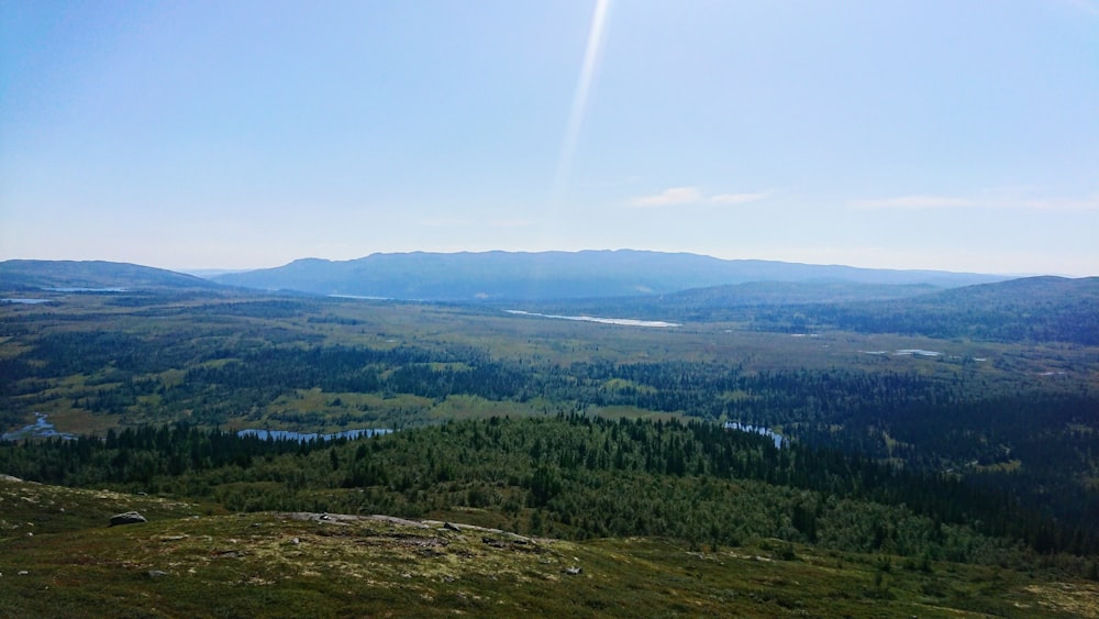 green mountains under blue sky at daytime