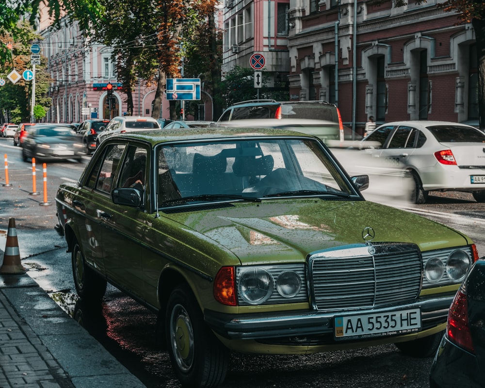 classic green Mercedes-Benz sedan