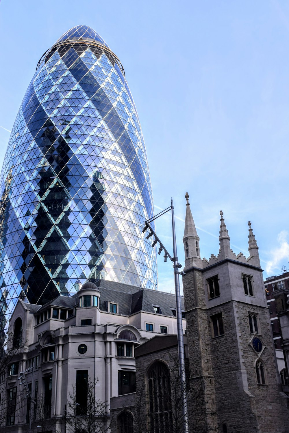 a very tall building next to a very tall building