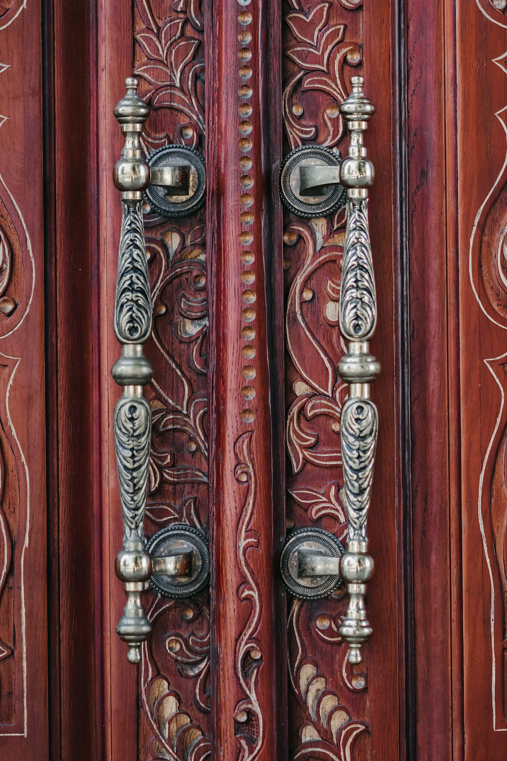 shallow focus photo of gray door handles