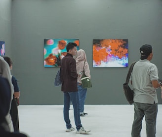 group of people visiting an exhibition.