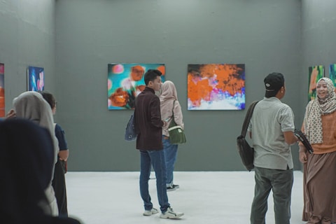 group of people visiting an exhibition.