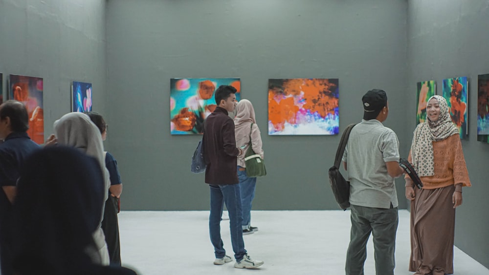 group of people inside museum painting