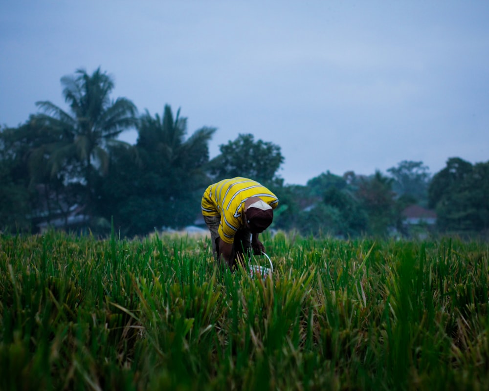 man on grass field