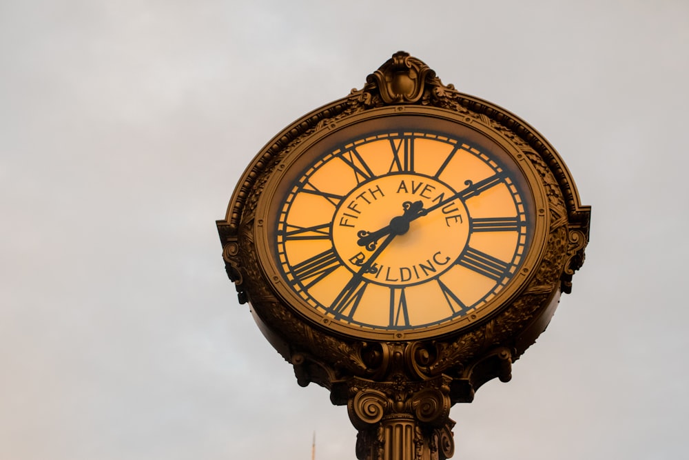 round brown Fifth Avenue Building clock